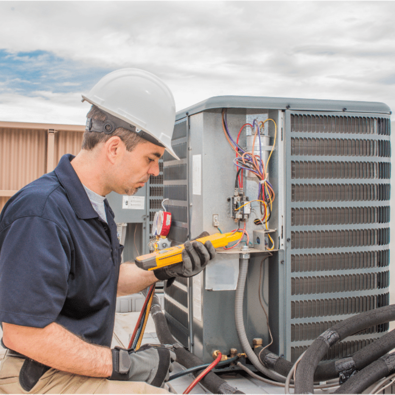 Guelph Furnace Repair HVAC technician servicing a system